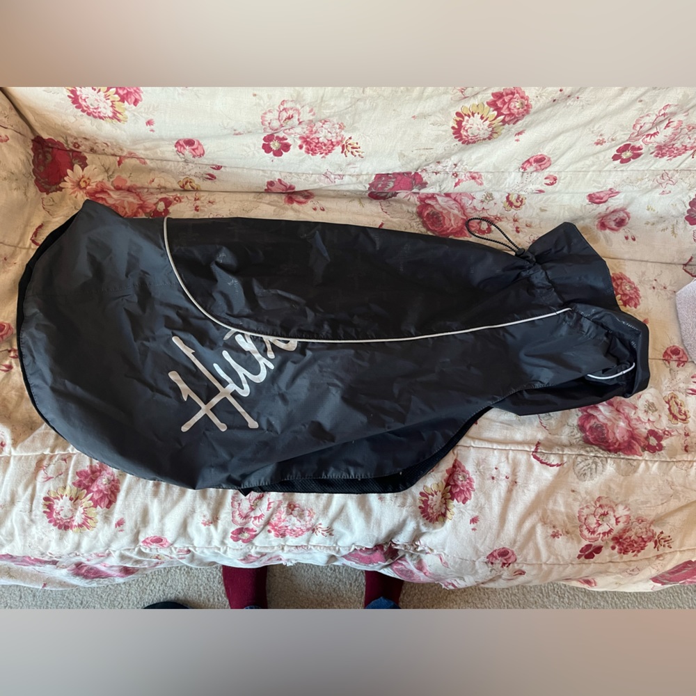 Hurtta dog rain coat.  Black.  Size 26” length